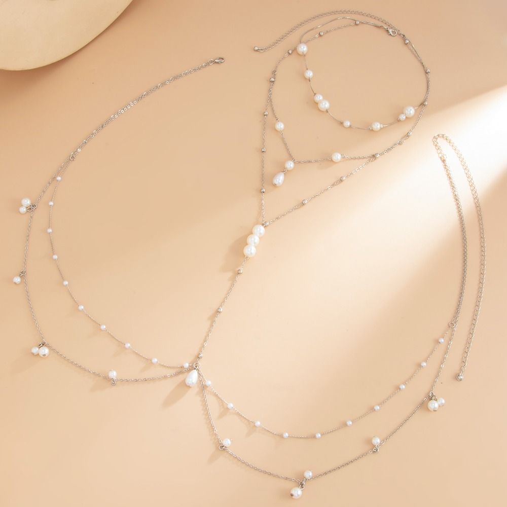 Mehrlagige Imitationsperlen-Ha – Body Jewelry By The Chain Gang Bewertung und Preis